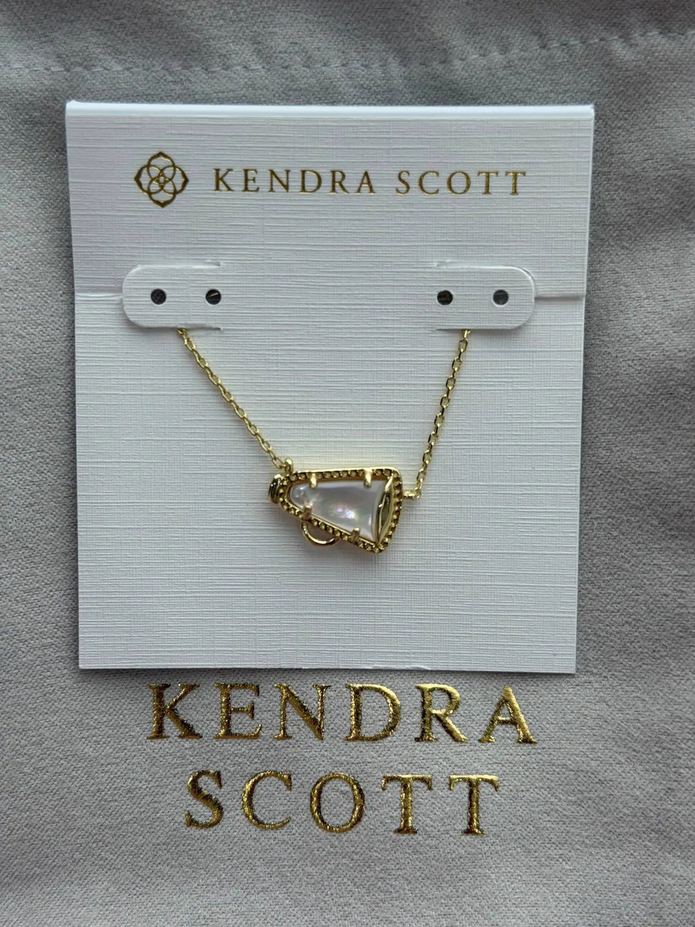 Kendra Scott white pendant gold necklace